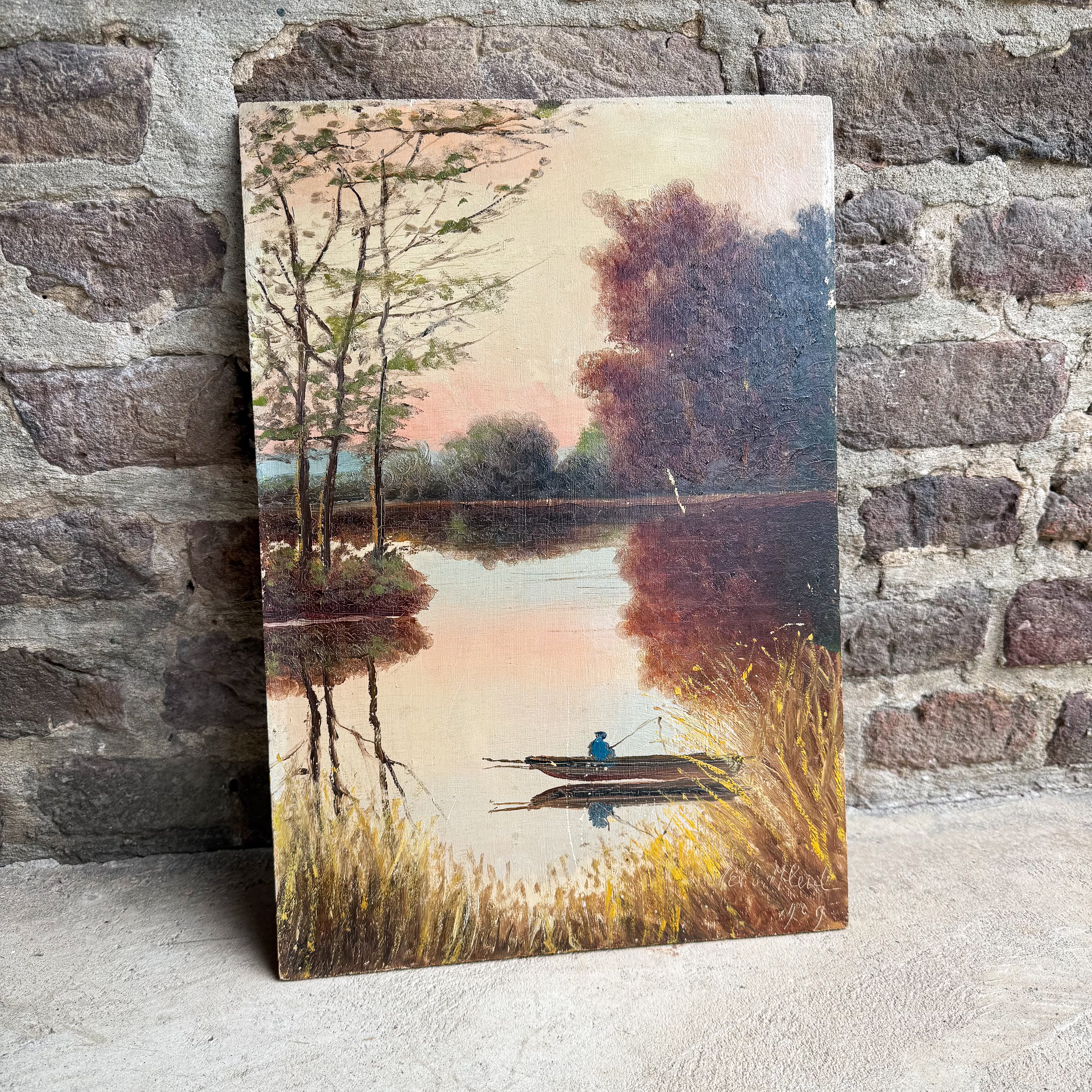 Vintage 1929 French folk art oil painting on wood panel of a fisherman in a rowboat on an autumn lake