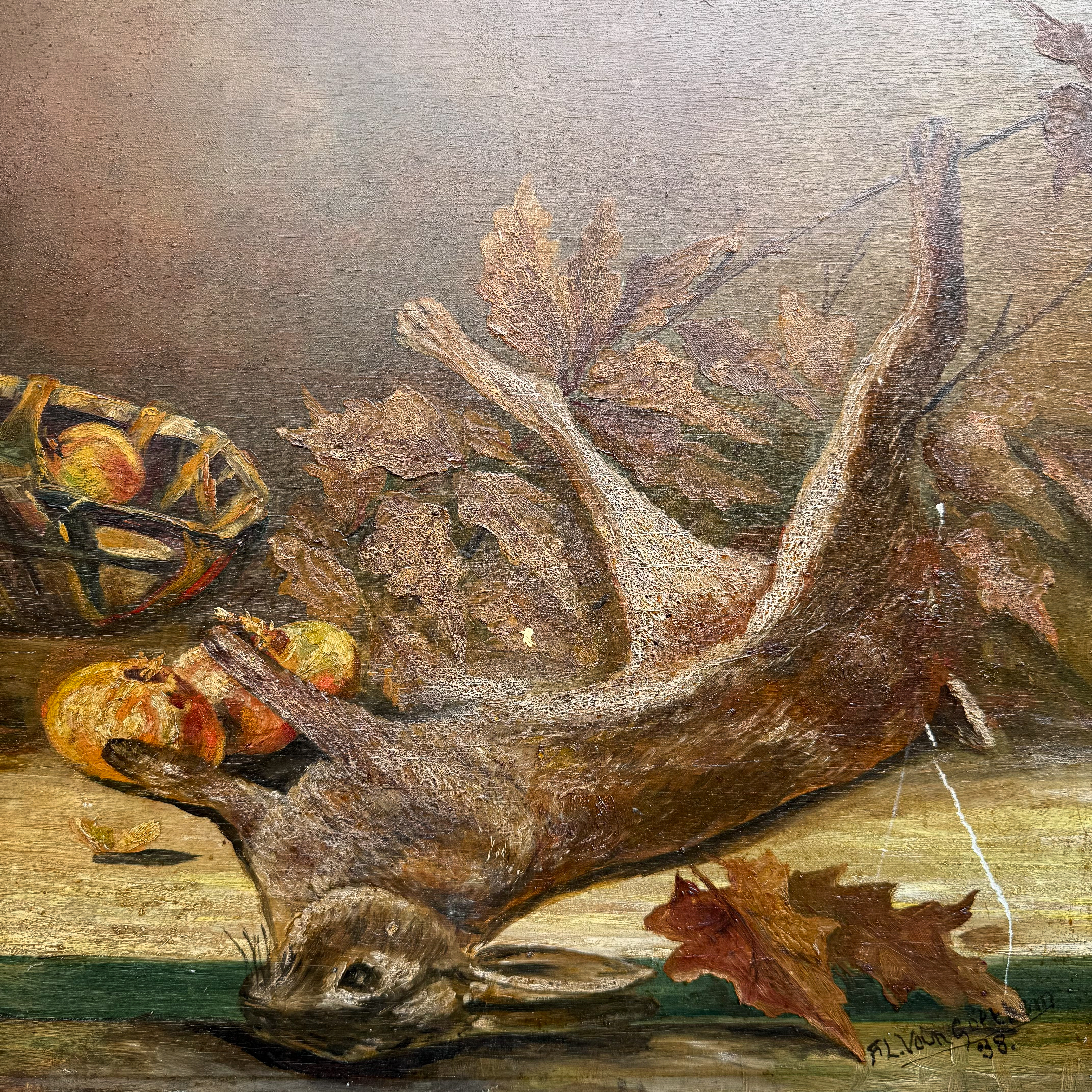 Vintage French still life painting with a rabbit, vase, fruit and autumn leaves on a rustic wooden table