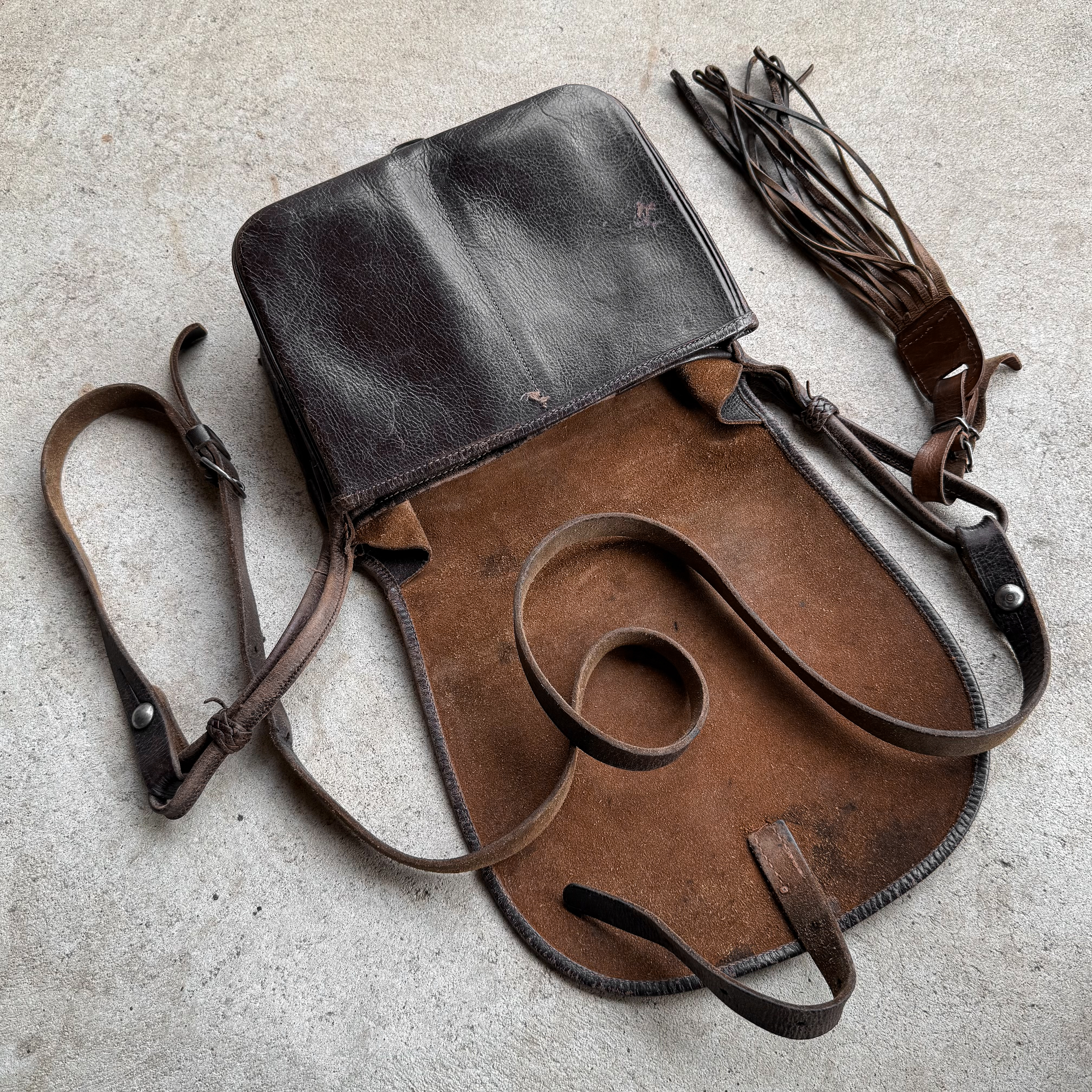 Vintage 1950s German leather hunting bag with leather game carrier.