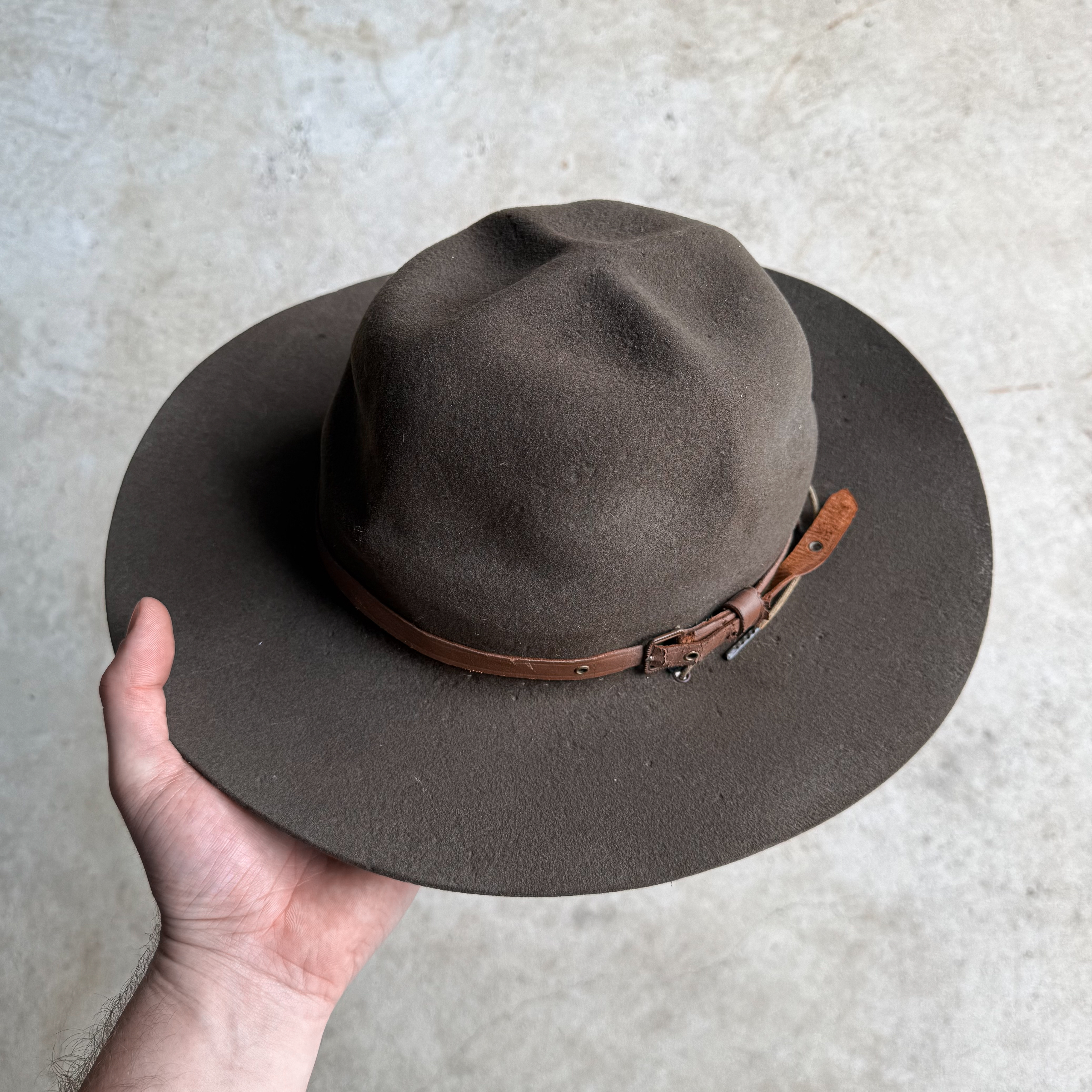 Vintage 1950s American Boy Scout felt campaign hat with wide brim, four-dent crown and leather hatband.